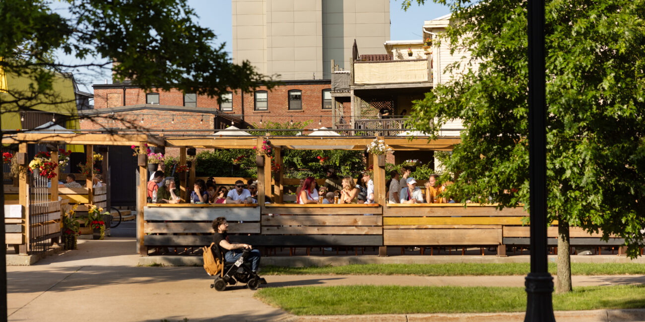 Patio seating at Good Robot Brewing overlooking the Halifax Common on a sunny day.